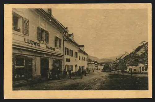 AK Obdach /Ober-Steiermark, Strassenpartie mit Geschäft von Ludwig Haring
