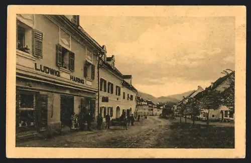 AK Obdach, Strassenpartie mit Geschäft von Ludwig Haring