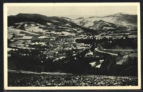 AK Uzok, Gesamtansicht mit Bergpanorama im Winter