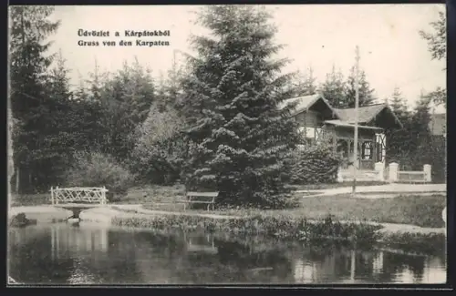 AK Gyertiyanliget /Kárpátok, Uferpartie mit Brücke