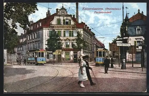 AK Kaiserslautern /Rheinpfalz, Fackelrondell mit Gasthaus Zum Hexenbäcker und Strassenbahn