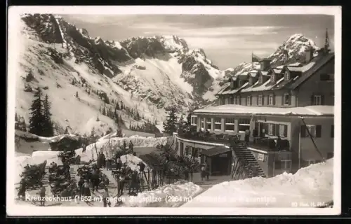 AK Berghütte Kreuzeckhaus, Panorama gegen Zugspitze im Schnee