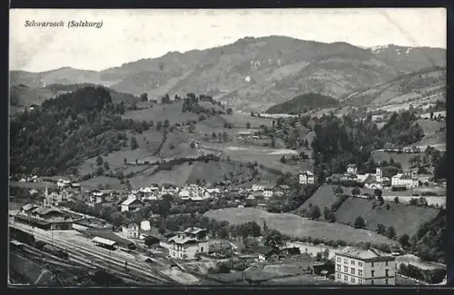 AK Schwarzach im Pongau, Blick über den Ort mit dem Bahnhof