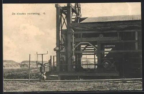 AK Maschine am Feld zur Torfgewinnung