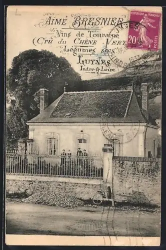 AK Luynes /Indre-et-Loire, Maison avec enseigne Aimé Bresnier et paysage en arrière-plan