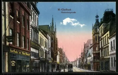 AK M.-Gladbach, Hindenburgstrasse mit Geschäften und Strasssenbahn