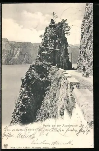 AK Axenstrasse, Mann mit Handwagen auf der Strasse