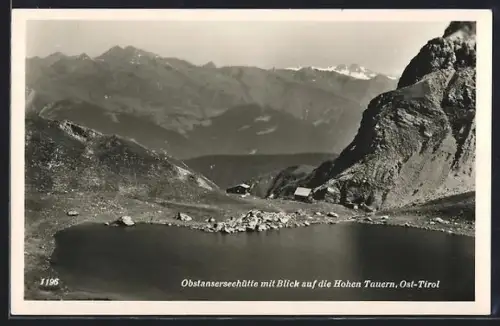 AK Obstanserseehütte /Ost-Tirol, Berghütte mit Blick auf die Hohen Tauern