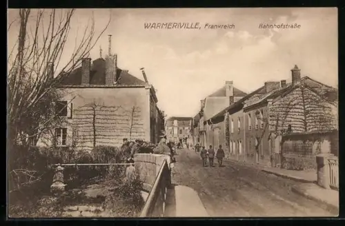 AK Warmeriville, rue de la gare, soldats dans la rue