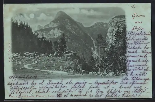 Mondschein-AK Lofer, Bergstrasse mit Gebäude und Bergpanorama