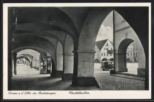 AK Arnau a. d. Elbe, Marktlauben mit Durchblick zum Markt