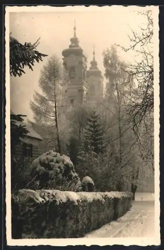 AK Ottobeuren, Strassenpartie mit Kirche im Winter