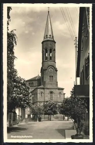 AK Rheinbischofsheim, Strassenpartie mit Kirche