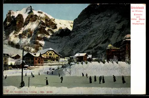 AK Grindelwald, Eisenbahn und Hotel Bären mit Wetterhorn im Winter