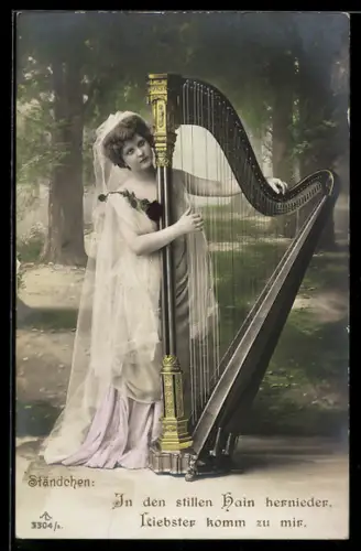 AK Frau stimmt ihre Harfe