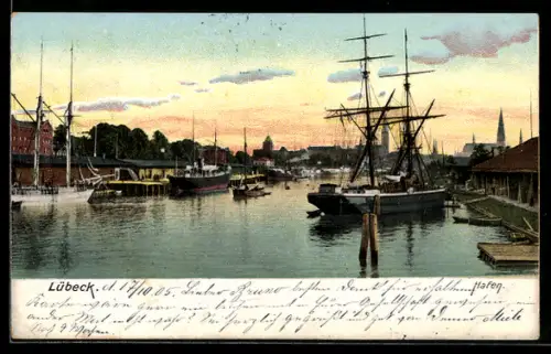 AK Lübeck, Hafen mit Segelschiffen und Stadtansicht