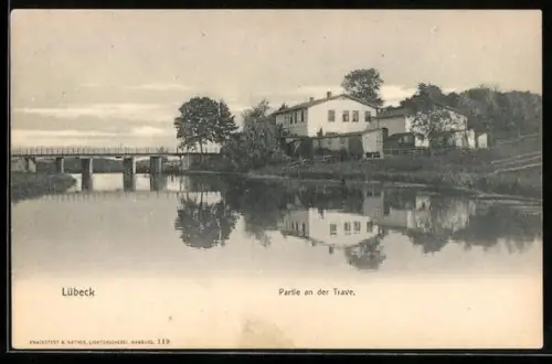 AK Lübeck, Partie an der Trave mit Brücke und Wohnhaus