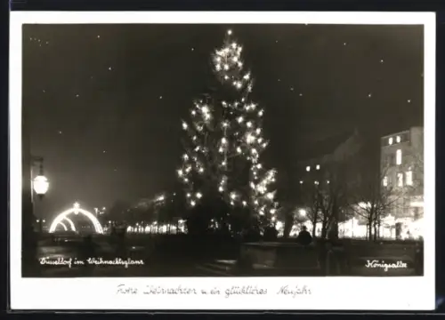 AK Düsseldorf, Weihnachtsbaum im Lichterglanz, Königsallee