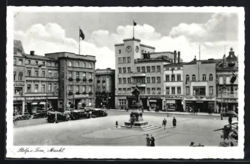 AK Stolp i. Pom., Markt mit Denkmal und Geschäften