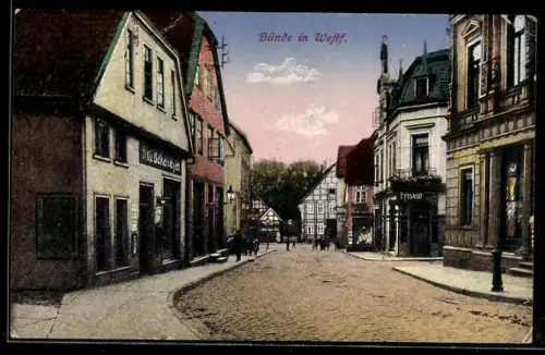 AK Bünde in Westf., Strassenansicht mit Friseur