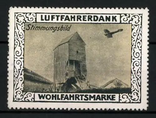 Reklamemarke Luftfahrerdank, Gebäude mit fliegendem Flugzeug