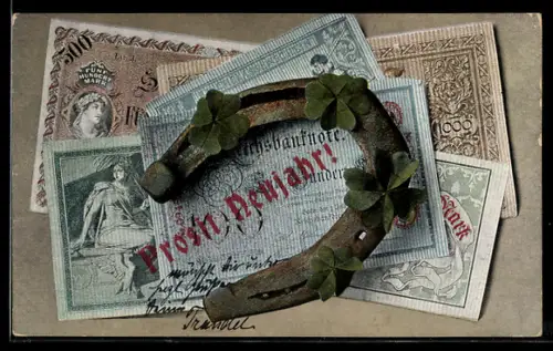 AK Hufeisen und Kleeblätter liegen auf Reichsbanknoten