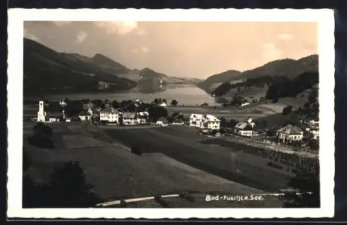 AK Bad Fuschl a. See, Ortspanorama mit See und Kirche