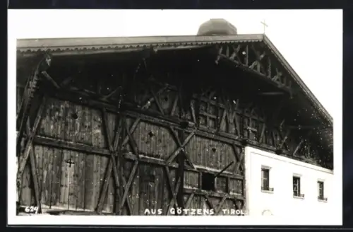 AK Götzens /Tirol, Teilansicht einer Holzfassade