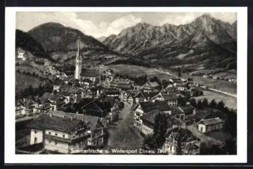 AK Ellmau /Tirol, Und Wintersport, Ortsansicht mit Kirche und Bergpanorama