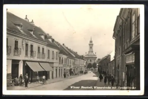 AK Wiener Neustadt, Wienerstrasse mit Geschäften u. Vorstadtkirche
