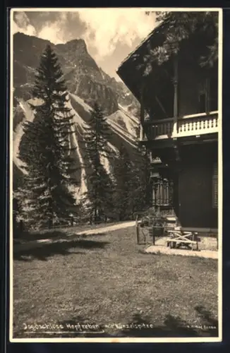 AK Schoppernau /Vorarlberg, Jagdschloss Hopfreben, Teilansicht mit Tannen und Gebirgspanorama