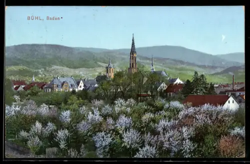 AK Bühl /Baden, Ortsansicht mit Kirche und blühenden Obstbäumen