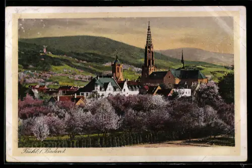 AK Bühl /Baden, Stadtansicht mit Kirche und blühenden Obstbäumen
