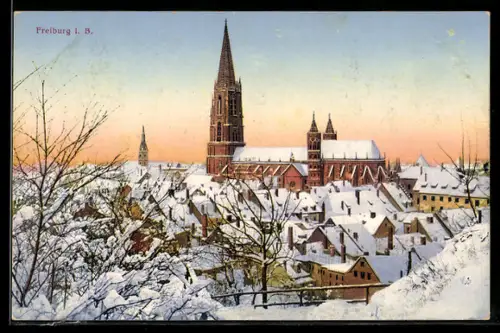AK Freiburg i. B., Münster im Winter, verschneite Stadtansicht