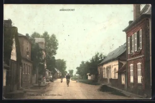AK Abancourt, Rue principale animée avec passants et maisons bordant la route