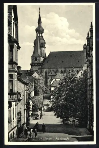 AK St. Wendel, Karlstrasse mit Kirche