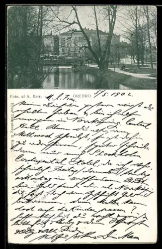 AK Örebro, Park und Gebäude von einem Teich aus
