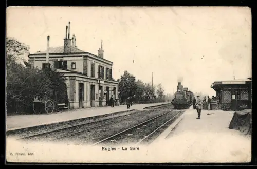 AK Rugles, La Gare et locomotive à vapeur sur le quai de la gare