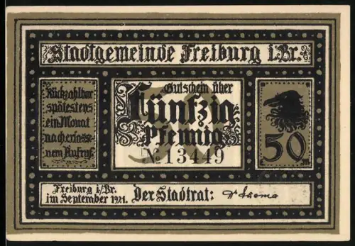 Notgeld Freiburg 1921, 50 Pfennig, Ortsansicht und zwei Wappen, kunstvoller Rahmen
