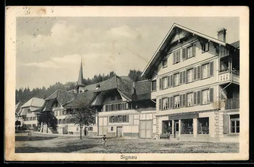 AK Signau, Strassenpartie mit Kirche und Schulbuchhandlung