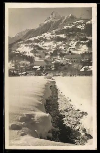 AK Tschagguns, Ansicht vom Ortsrand aus im Winter