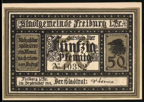 Notgeld Freiburg i. Br. 1921, 50 Pfennig, Ortsansicht mit zwei Wappen und Turm