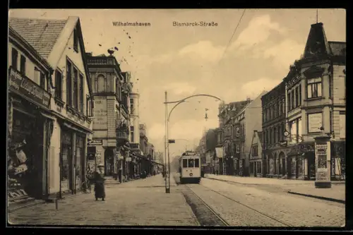 AK Wilhelmshaven, Bismarck-Strasse mit Geschäften und Strassenbahn