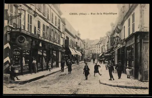 AK Creil /Oise, Rue de la République animée avec boutiques et passants