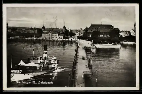 AK Konstanz, Partie am Hafen, mit Dampfer