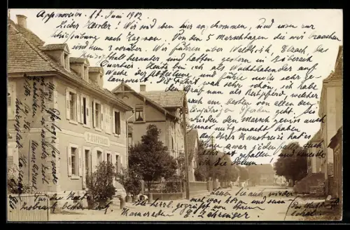 Foto-AK Appenweier, Strassenpartie mit Geschäft von F. Kupferer