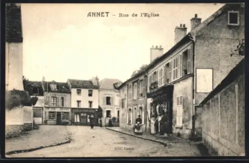 AK Annet, Rue de l`Église avec des habitants devant les boutiques