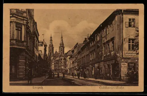 AK Liegnitz, Goldbergerstrasse mit Colonialwarenhandel