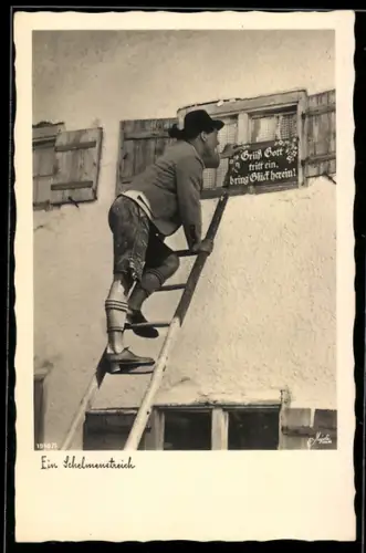 AK Mann in Tracht auf einer Leiter beim Fensterln