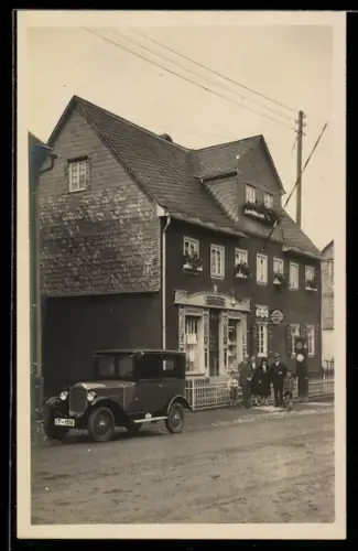 Foto-AK Weisel /Rhein, Altpforter Strasse mit Kolonialwaren Wilh. S.